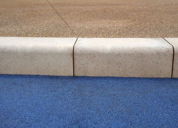 Curb And Sidewalk Installation in Benton